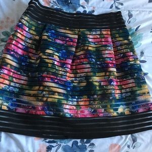 Short skirt with colorful floral pattern.